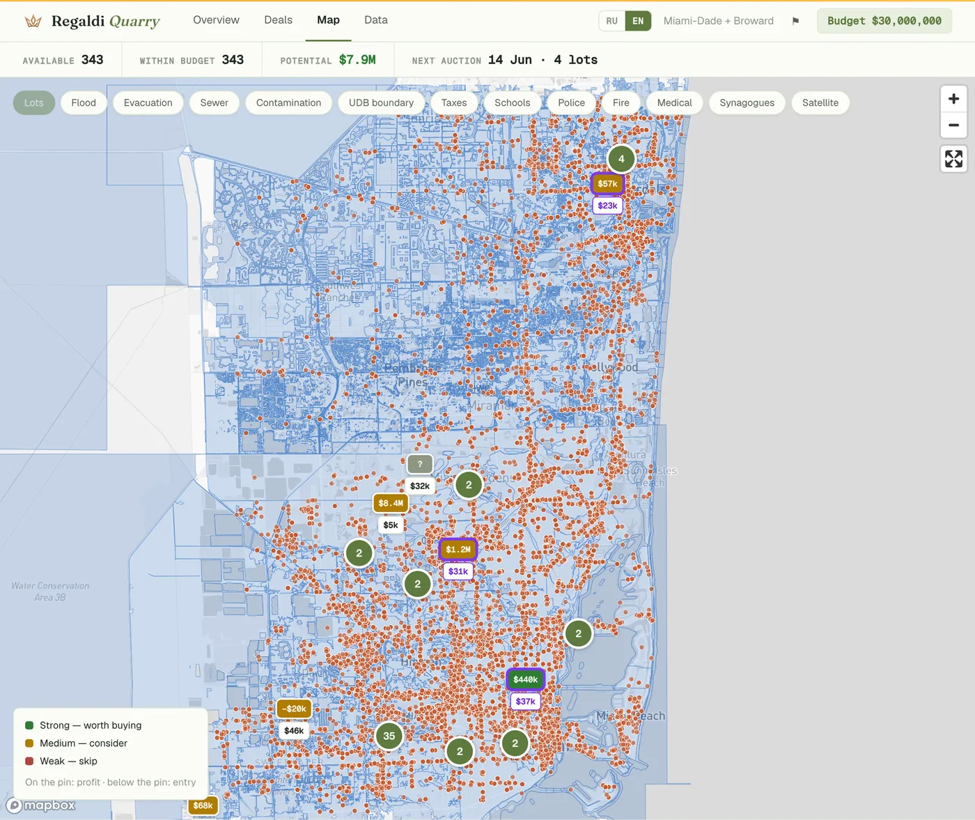 Quarry map zoomed to the Miami to Fort Lauderdale corridor with FEMA flood zones and FDEP contamination sites overlaid.